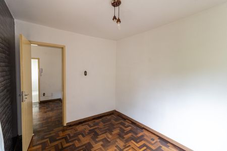 Quarto 1 de apartamento à venda com 3 quartos, 70m² em Santo Antônio, Porto Alegre