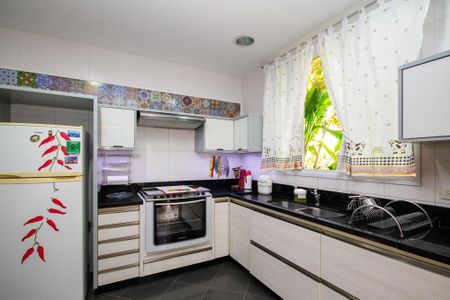 Casa de condomínio para alugar com 380m², 3 quartos e 4 vagasCozinha