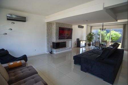 Sala de casa de condomínio para alugar com 3 quartos, 181m² em Mário Quintana, Viamão