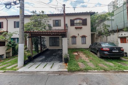 Casa de condomínio à venda com 100m², 2 quartos e 2 vagasFachada e Garagem
