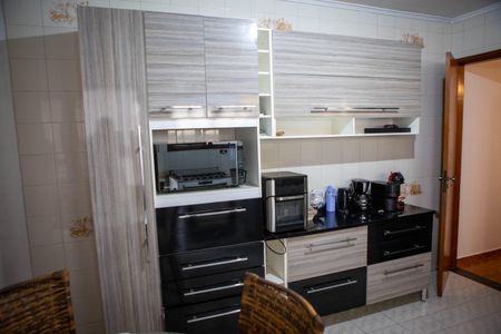 Casa à venda com 128m², 3 quartos e 2 vagas Casa à venda com 128m², 3 quartos e 2 vagasCozinha