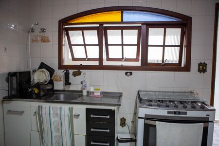 Casa à venda com 128m², 3 quartos e 2 vagas Casa à venda com 128m², 3 quartos e 2 vagasCozinha