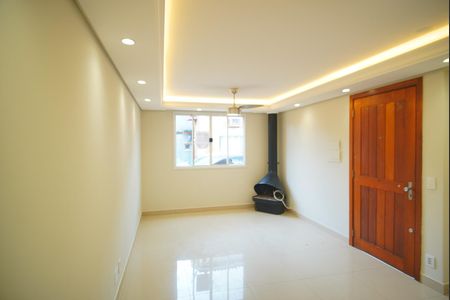 Sala de casa de condomínio à venda com 3 quartos, 86m² em Jardim Itu, Porto Alegre