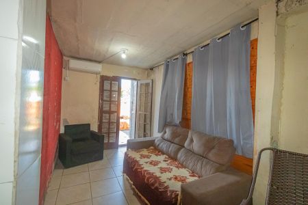 Sala 1 de casa à venda com 4 quartos, 140m² em Guajuviras, Canoas