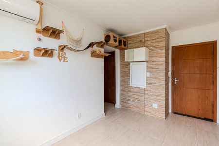 Sala de apartamento para alugar com 1 quarto, 35m² em Vila Nova, Porto Alegre