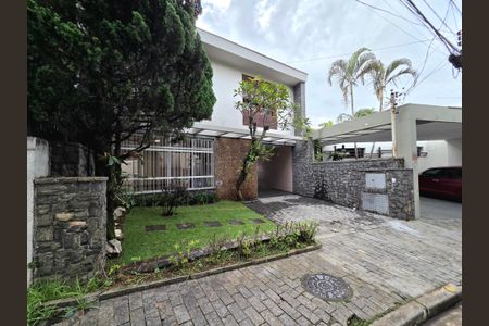 Casa de condomínio à venda com 260m², 4 quartos e 2 vagasFachada