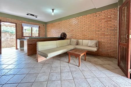 Sala de casa de condomínio para alugar com 2 quartos, 65m² em Campeche Leste, Florianópolis