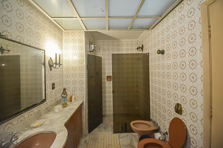 Casa à venda com 397m², 3 quartos e 4 vagasBanheiro da Suíte