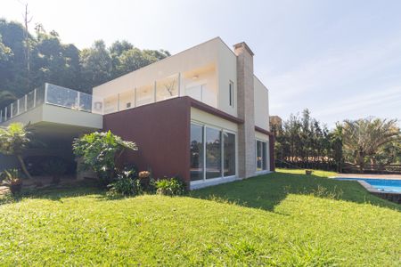 Casa de condomínio para alugar com 494m², 4 quartos e 5 vagasQuintal