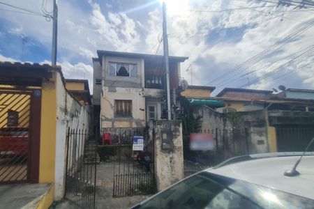 Casa à venda com 199m², 4 quartos e sem vagaFachada do imóvel com placa QuintoAndar