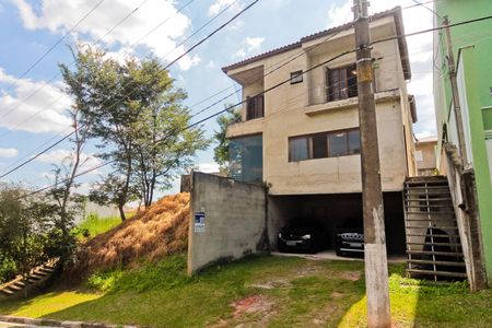 Casa de condomínio à venda com 300m², 4 quartos e 4 vagasFachada + Placa