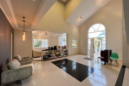 Casa de condomínio para alugar com 300m², 3 quartos e 4 vagasSala de estar