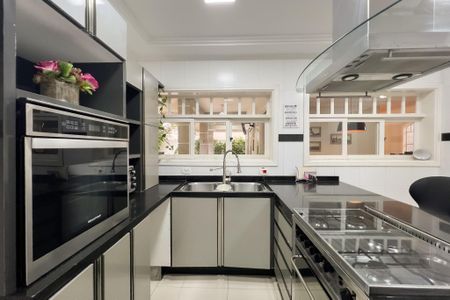 Casa de condomínio para alugar com 300m², 3 quartos e 4 vagasCozinha