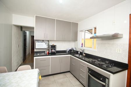 Casa à venda com 106m², 3 quartos e 2 vagas Casa à venda com 106m², 3 quartos e 2 vagasCozinha