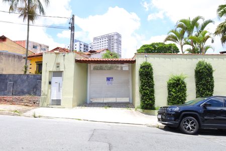 Casa de condomínio à venda com 104m², 3 quartos e 2 vagasFachada do condomínio - Placa instalada no portão do imóvel - Código da placa: MWXC-294