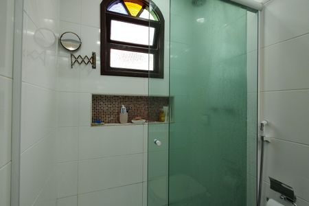 Casa de condomínio para alugar com 306m², 3 quartos e 2 vagasBanheiro da Suíte 1