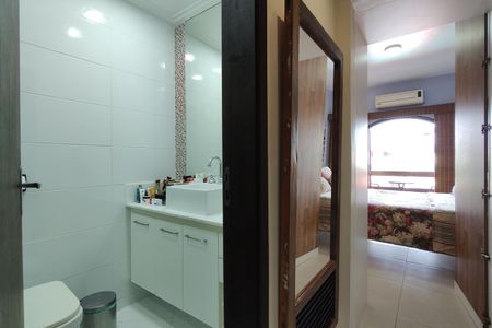 Casa de condomínio para alugar com 306m², 3 quartos e 2 vagasBanheiro da Suíte 1