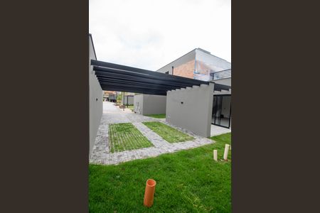 Casa de condomínio à venda com 185m², 3 quartos e 2 vagasÁREA EXTERNA FRENTE