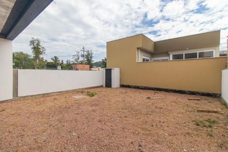 Casa de condomínio à venda com 120m², 3 quartos e 2 vagasQuintal