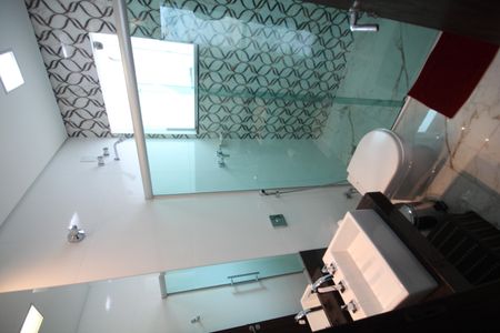 Casa à venda com 322m², 4 quartos e 4 vagasBanheiro 1