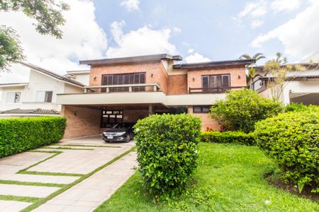 Casa de condomínio à venda com 490m², 4 quartos e 2 vagas Casa de condomínio à venda com 490m², 4 quartos e 2 vagasVista da Rua