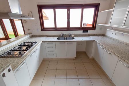 Casa de condomínio à venda com 370m², 4 quartos e 3 vagas Casa de condomínio à venda com 370m², 4 quartos e 3 vagasCozinha