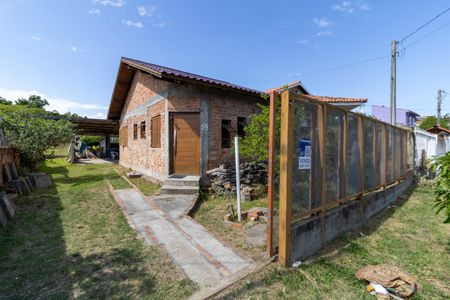 Casa à venda com 100m², 3 quartos e 1 vaga Casa à venda com 100m², 3 quartos e 1 vagaFachada