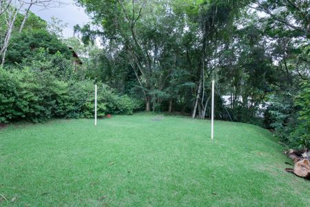 Casa de condomínio à venda com 276m², 3 quartos e 4 vagasQuintal