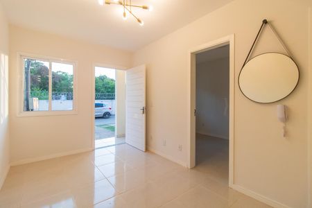 Sala de casa de condomínio para alugar com 2 quartos, 49m² em Hípica, Porto Alegre