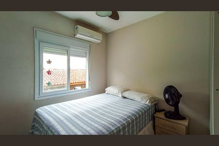 Quarto 1 de casa de condomínio à venda com 3 quartos, 76m² em Vila Nova, Porto Alegre