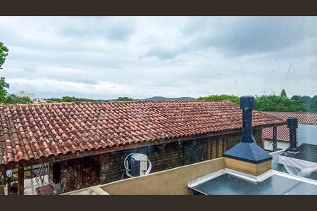 Vista  de casa de condomínio à venda com 3 quartos, 76m² em Vila Nova, Porto Alegre