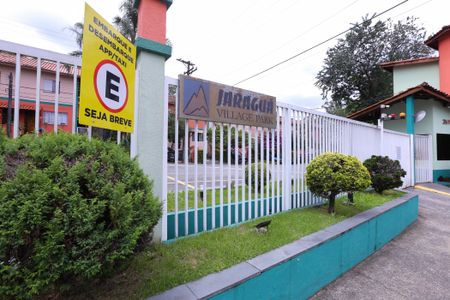 Casa de condomínio para alugar com 150m², 2 quartos e 1 vagaFachada e portaria