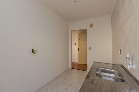 Apartamento à venda com 58m², 2 quartos e 1 vaga Apartamento à venda com 58m², 2 quartos e 1 vagaCozinha e Área de Serviço
