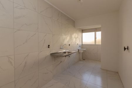 Apartamento à venda com 58m², 2 quartos e 1 vaga Apartamento à venda com 58m², 2 quartos e 1 vagaCozinha e Área de Serviço