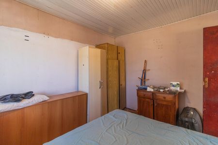 Casa à venda com 70m², 2 quartos e 2 vagasQuarto 1