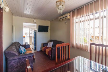 Sala de casa à venda com 2 quartos, 70m² em Vila Nova, Porto Alegre