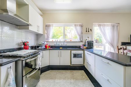 Casa de condomínio à venda com 404m², 4 quartos e 6 vagasCozinha