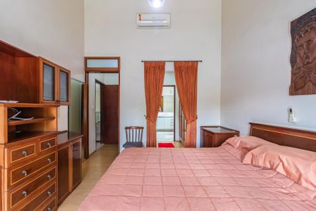 Casa de condomínio à venda com 404m², 4 quartos e 6 vagasSuíte