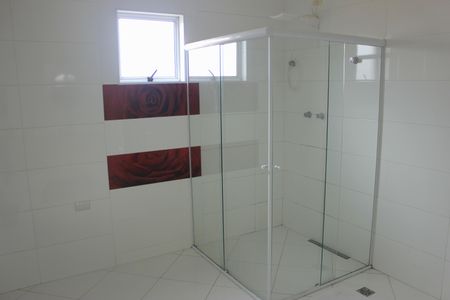 Casa à venda com 385m², 4 quartos e 7 vagasBanheiro da Suíte 4