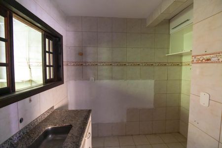 Casa de condomínio à venda com 100m², 2 quartos e 1 vaga Casa de condomínio à venda com 100m², 2 quartos e 1 vagaCozinha e Área de Serviço