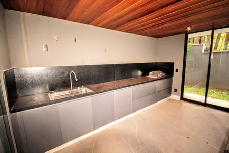 Casa de condomínio à venda com 403m², 4 quartos e 4 vagasÁrea gourmet