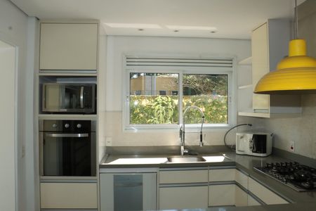 Casa de condomínio para alugar com 295m², 4 quartos e 4 vagasCozinha