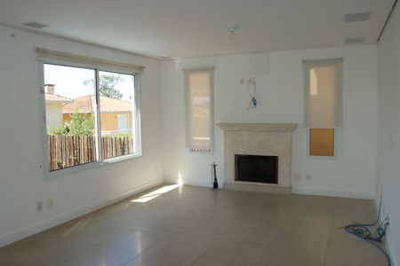 Casa de condomínio para alugar com 295m², 4 quartos e 4 vagasSala