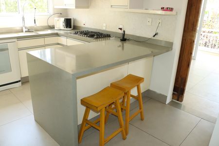 Casa de condomínio para alugar com 295m², 4 quartos e 4 vagasCozinha