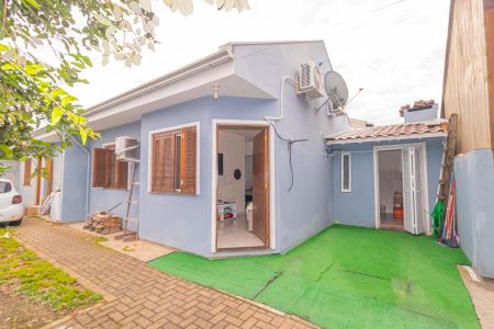 Fachada de casa de condomínio à venda com 2 quartos, 42m² em Harmonia, Canoas