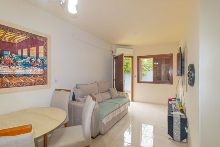 Sala de casa de condomínio à venda com 2 quartos, 42m² em Harmonia, Canoas