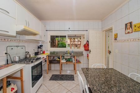 Casa à venda com 170m², 3 quartos e 2 vagas Casa à venda com 170m², 3 quartos e 2 vagasCozinha e Área de Serviço