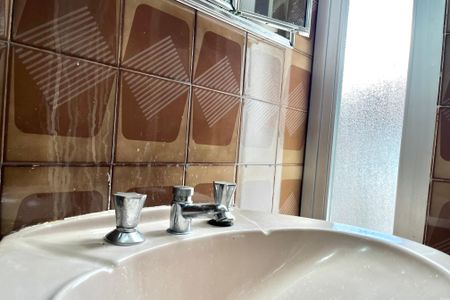 Casa à venda com 410m², 5 quartos e 3 vagasBanheiro da Suíte 3