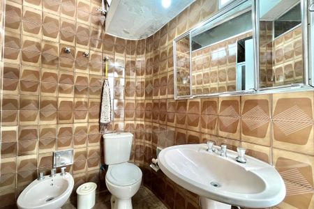 Casa à venda com 410m², 5 quartos e 3 vagasBanheiro da Suíte 3