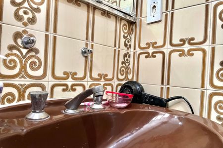 Casa à venda com 410m², 5 quartos e 3 vagasBanheiro da Suíte 1